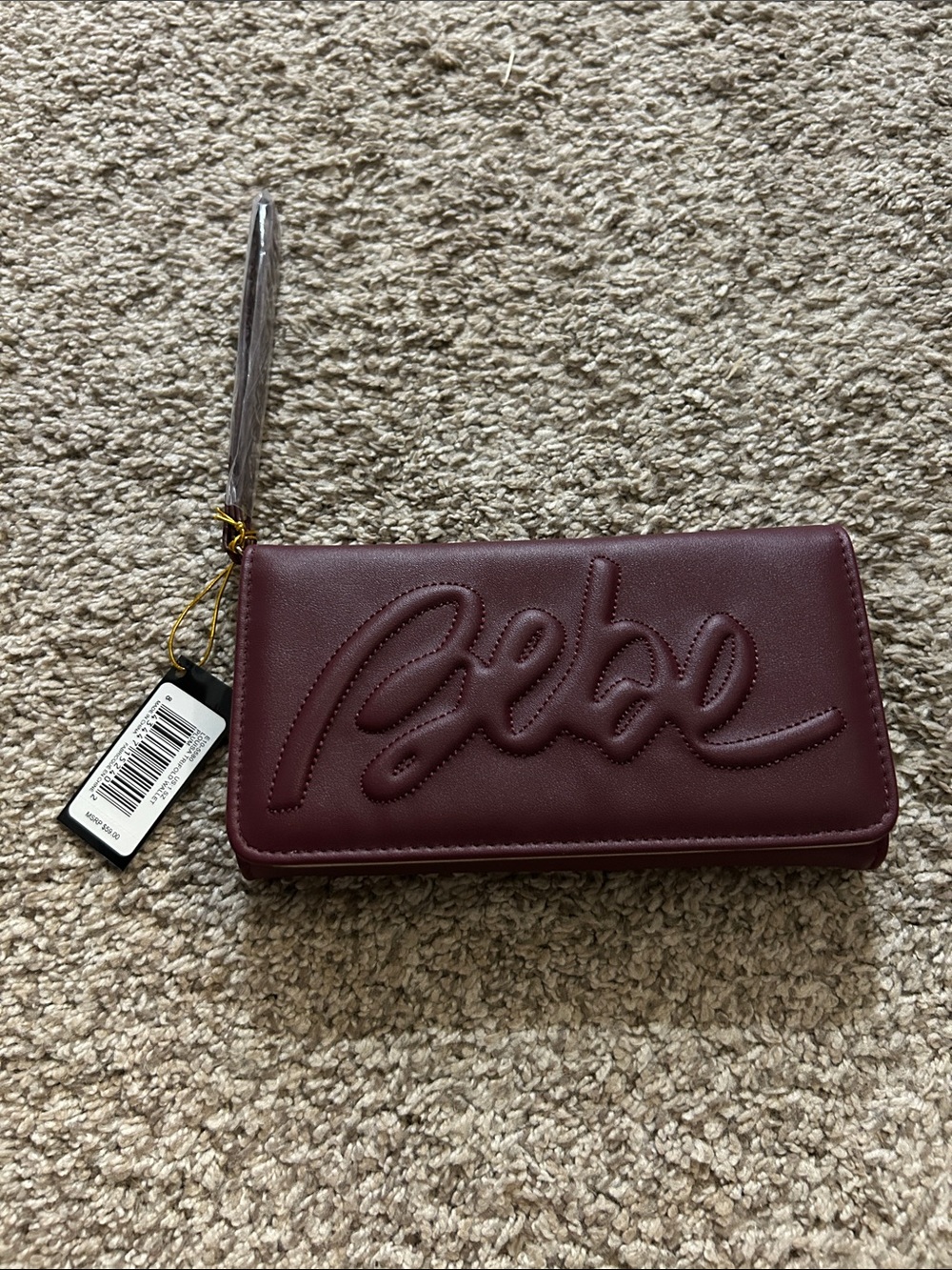 bebe Burgundy Quilted Script Wristlet Wallet